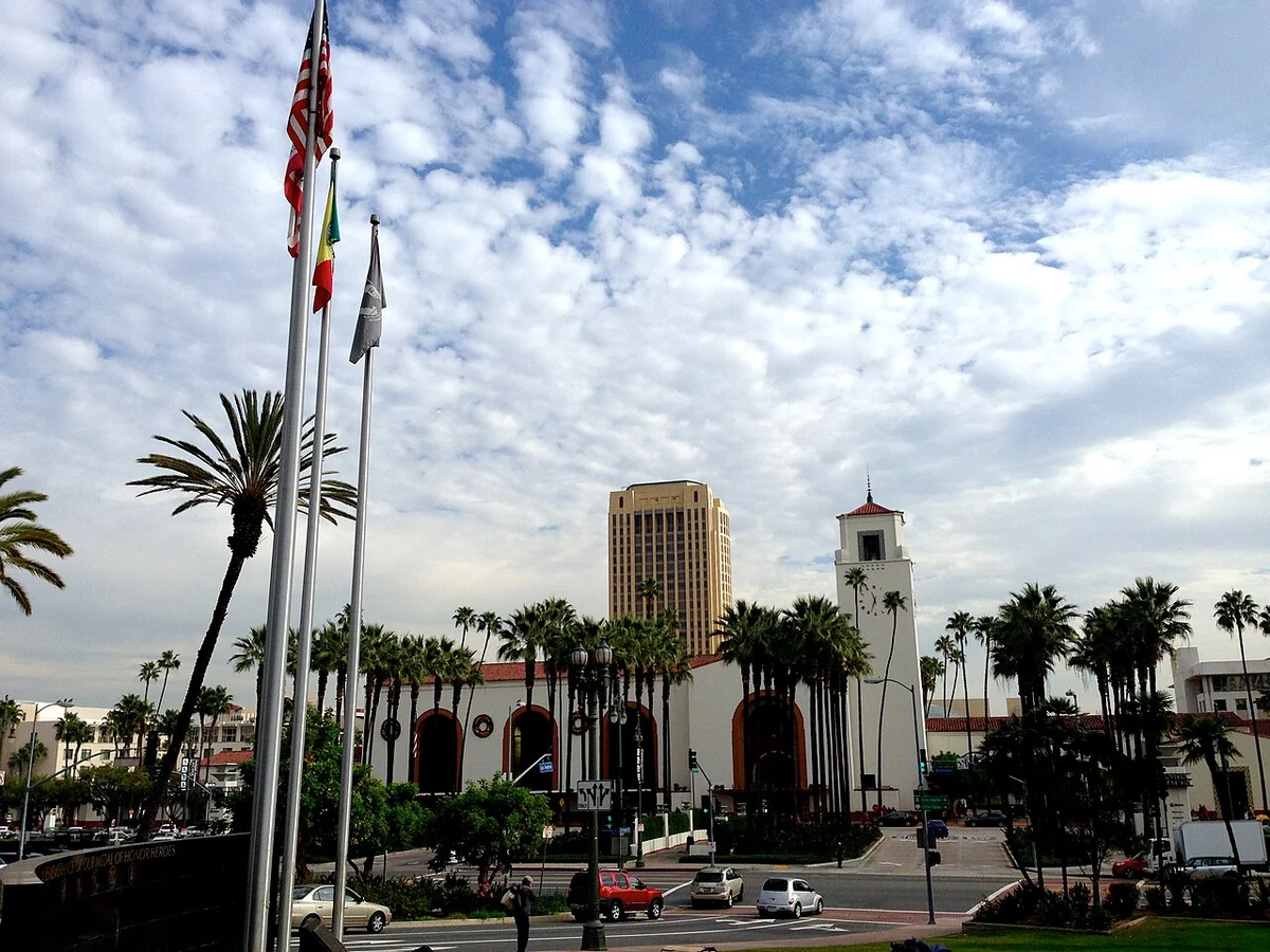 Los Angeles Union Station exterior with its clock tower and palm trees